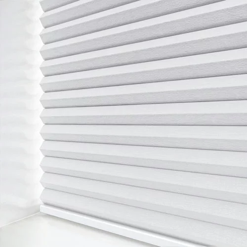 https://postmyblinds.co.uk/hub/blinds/pleated-blind/arcade-blackout-white-pleated-blind-3.webp
