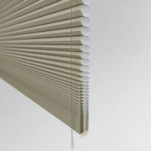 https://postmyblinds.co.uk/hub/blinds/pleated-blind/primodal-blackout-cream-pleated-blind-4.webp