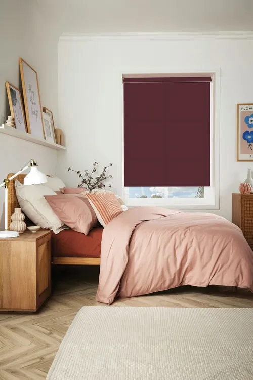 https://postmyblinds.co.uk/hub/blinds/roller-blind/carnival-blackout-malbec-roller-blind-2.webp