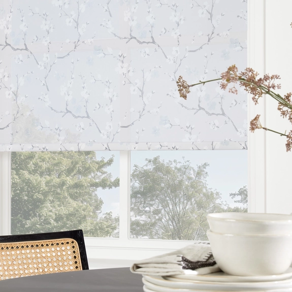 https://postmyblinds.co.uk/hub/blinds/roller-blind/cherry-blossom-misty-blue-roller-blind-3.webp