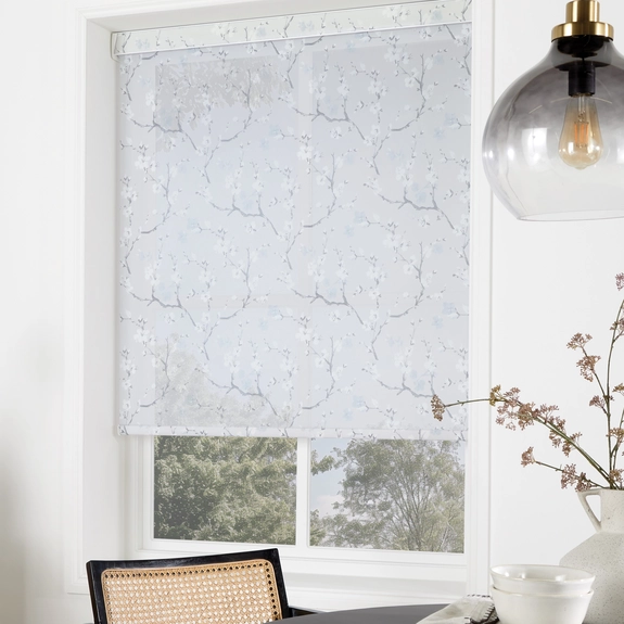 https://postmyblinds.co.uk/hub/blinds/roller-blind/cherry-blossom-misty-blue-roller-blind-4.webp