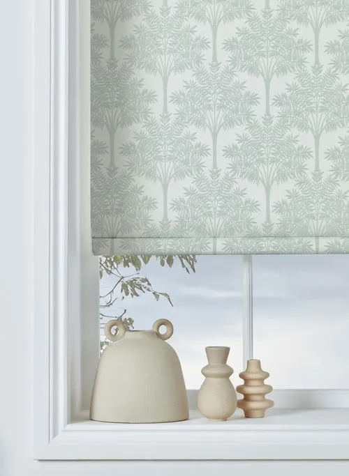 https://postmyblinds.co.uk/hub/blinds/roller-blind/kaitlyn-blackout-silver-roller-blind-3.webp