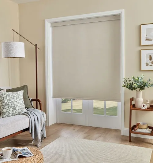https://postmyblinds.co.uk/hub/blinds/roller-blind/oxford-blackout-sandstone-roller-blind-2.webp