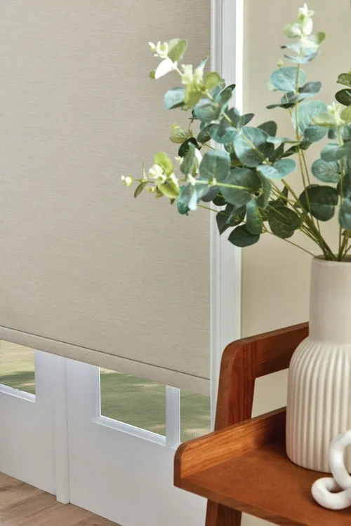 https://postmyblinds.co.uk/hub/blinds/roller-blind/oxford-blackout-sandstone-roller-blind-3.webp
