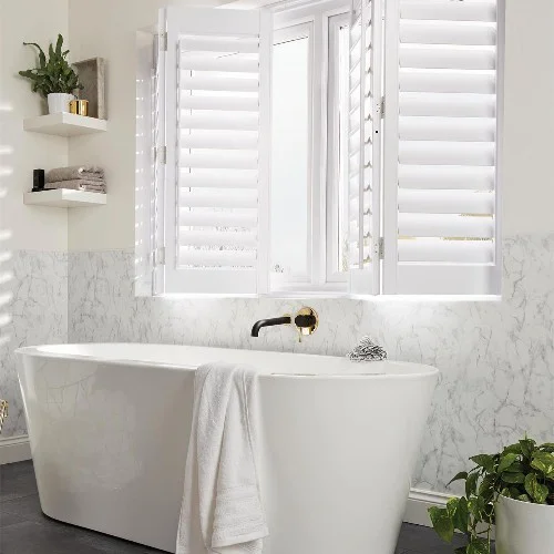 https://postmyblinds.co.uk/hub/blinds/shutter-blind/moira-arctic-white-shutter-blind-4.webp