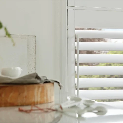 https://postmyblinds.co.uk/hub/blinds/shutter-blind/moira-cotton-white-shutter-blind-2.webp