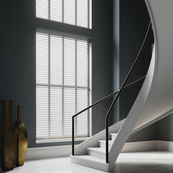 https://postmyblinds.co.uk/hub/blinds/shutter-blind/nyah-vivid-white-shutter-blind-2.webp